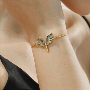 Elegant Gold Winged Bracelet